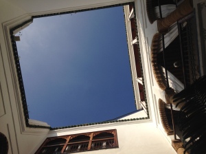 Looking directly up while sitting in the courtyard, which is open to the outdoors