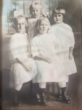 History: My grandmother is the sister with dark hair on the right